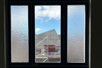 View from the window of the current building onto the construction site of the new building
