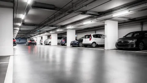 Interior view of an illuminated car park